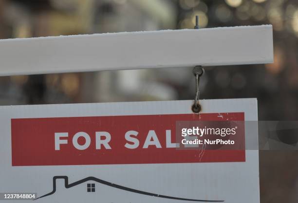 For Sale sign seen outside a house in the center of Edmonton. On Wednesday, January 19 in Edmonton, Alberta, Canada.
