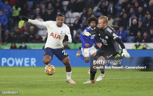 Tottenham Hotspur's Steven Bergwijn goes past Leicester City's Kasper Schmeichel before scoring his sides third goal during the Premier League match...