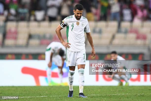 Algeria's forward Riyad Mahrez reacts after Ivory Coast's forward Nicolas Pepe scored Ivory Coast's third goal during the Group E Africa Cup of...