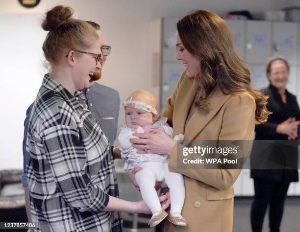 Catherine, Duchess of Cambridge meets Trudi and Alastair Barrie and their daughter Anastasia during a visit to charity, Church on the Street, on...