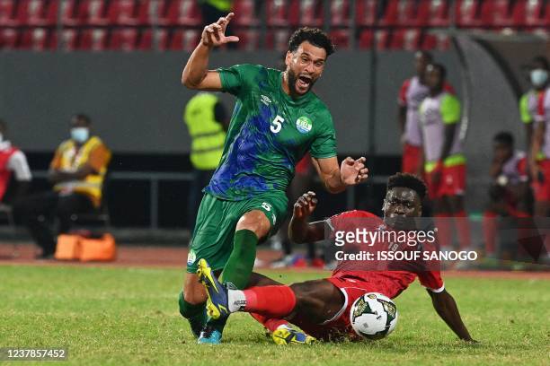 Sierra Leone's defender Steven Caulker is tackled by Equatorial Guinea's forward Luis Nlavo during the Group E Africa Cup of Nations 2021 football...