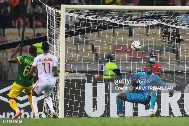 Mali's defender Massadio Haidara shoots and scores his team's first goal during the Group F Africa Cup of Nations 2021 football match between Mali...
