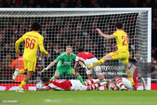 Diogo Jota of Liverpool scores the opening goal during the Carabao Cup Semi Final Second Leg match between Arsenal and Liverpool at Emirates Stadium...