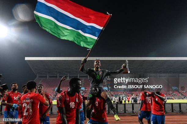 Gambia's players celebrate after winning the Group F Africa Cup of Nations 2021 football match between Gambia and Tunisia at Limbe Omnisport Stadium...