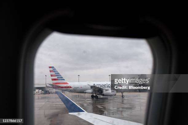 An American Airlines plane on the tarmac at Raleigh-Durham International Airport in Morrisville, North Carolina, U.S., on Thursday, Jan. 20, 2022....