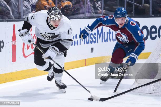 Trevor Moore of the Los Angeles Kings and Cale Makar of the Colorado Avalanche battle for the puck during the first period at Crypto.com Arena on...