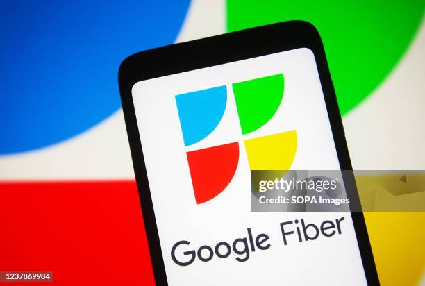 In this photo illustration, a Google Fiber Inc. Logo is seen displayed on a smartphone screen.