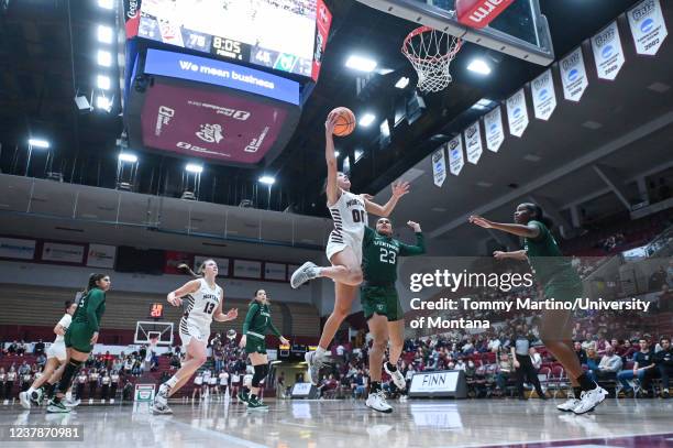 Sammy Fatkin of the Montana Grizzlies shoots a layup during a college basketball game between the Montana Grizzlies and the Portland State Vikings at...