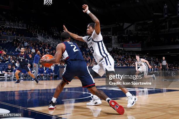Butler Bulldogs guard Jayden Taylor defends against Connecticut Huskies guard R.J. Cole during a college basketball game on Jan. 20, 2022 at Hinkle...