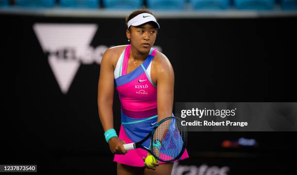 Naomi Osaka of Japan in action during her third round singles match against Amanda Anisimova of the United States at the 2022 Australian Open at...
