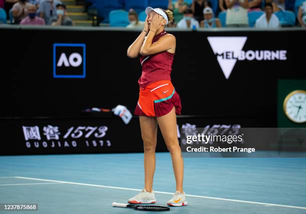 Amanda Anisimova of the United States reacts to winning her third round singles match against Naomi Osaka of Japan at the 2022 Australian Open at...