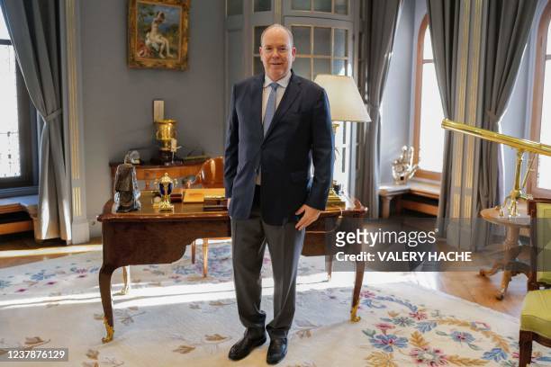 Prince Albert II of Monaco poses in Monaco Palace, on January 21, 2022.