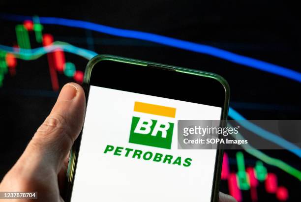In this photo illustration the Brazilian multinational oil and gas corporation Petróleo Brasileiro S.A., Petrobras, logo seen displayed on a...