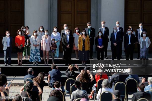 Chilean President-elect Gabriel Boric poses for a picture with his ministers during the presentation of his government cabinet at the Natural History...