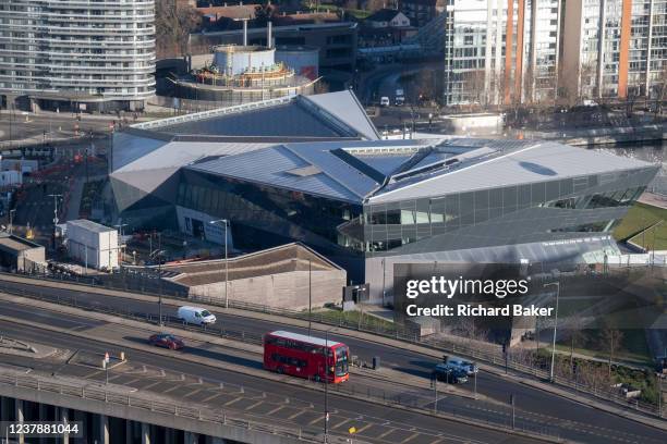 An aerial view from the Emirates Air Line cable car, of the A1011 North Woolwich Road and the London Assembly's new City Hall at Royal Dock in the...