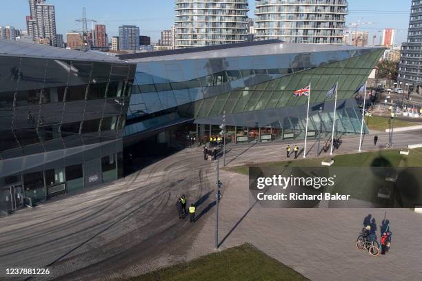 An aerial view from the Emirates Air Line cable car, of high-rise residential properties and the London Assembly's new City Hall at Royal Dock in the...