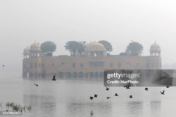 Thick layer of fog engulfs the historical Jal Mahal on a cold winter day , in Jaipur, Rajasthan, India, Friday, Jan 21,2022.