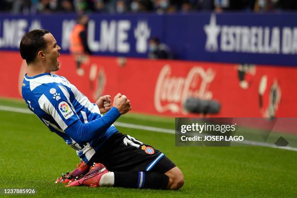 Espanyol's Spanish forward Raul de Tomas celebrates scoring the opening goal during the Spanish league football match between RCD Espanyol and Real...