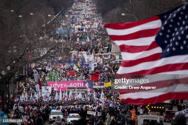 Thousands of anti-abortion activists march along Constitution Avenue during the 49th annual March for Life rally on January 21, 2022 in Washington,...