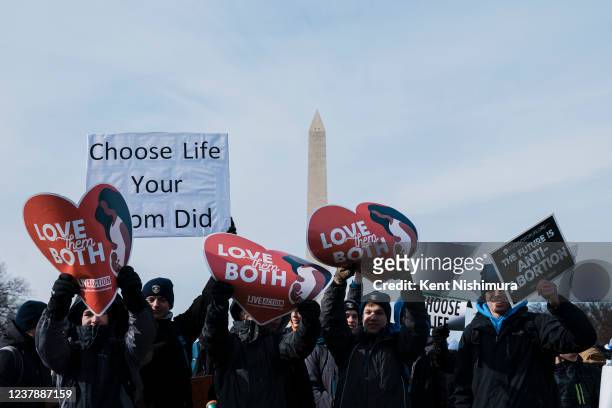 People attending the annual Pro-Life gathering, March for Life, on gather on the National Mall on Friday, Jan. 21, 2022 in Washington, DC.