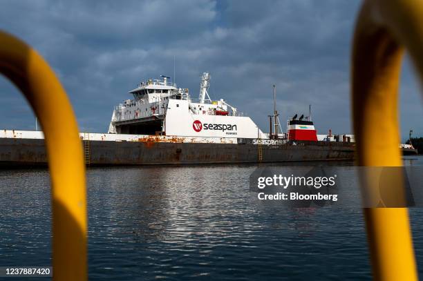 Vehicles and containers are loaded onto a Seaspan ferry during a strike in Swartz Bay, British Columbia, Canada, on Friday, Jan. 21, 2022. Deliveries...