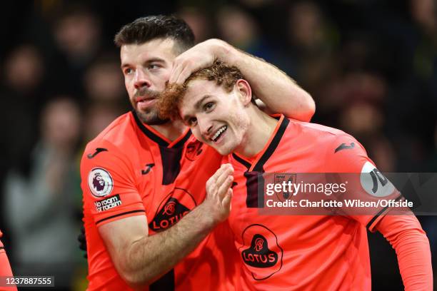 Josh Sargent of Norwich celebrates scoring their 2nd goal with Grant Hanley during the Premier League match between Watford and Norwich City at...