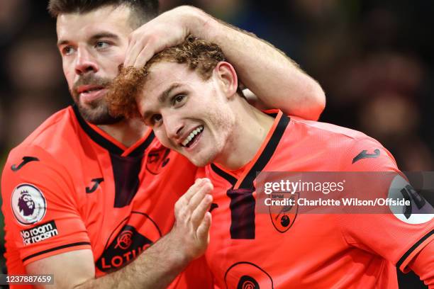 Josh Sargent of Norwich celebrates scoring their 2nd goal with Grant Hanley during the Premier League match between Watford and Norwich City at...