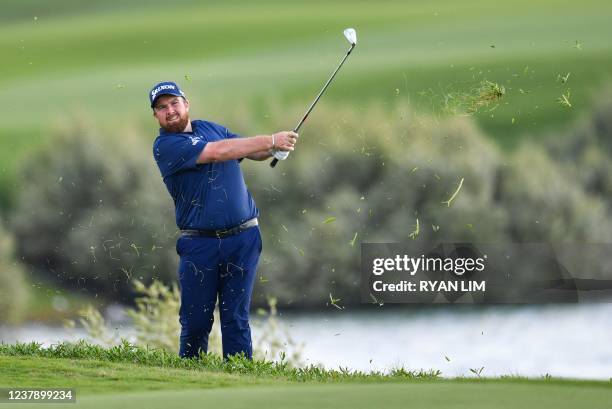 Shane Lowry of Ireland plays a shot at the 18th hole during the third round of the Abu Dhabi HSBC championship at Yas Links Golf Course, on January...