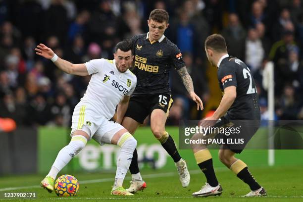 Leeds United's English midfielder Jack Harrison vies with Newcastle United's English defender Kieran Trippier and Newcastle United's Scottish...