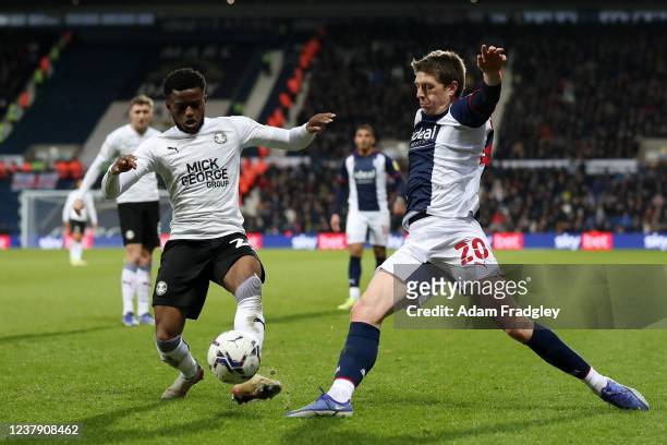 Bali Mumba of Peterborough United and Adam Reach of West Bromwich Albion during the Sky Bet Championship match between West Bromwich Albion and...