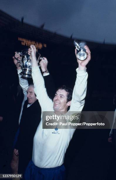 Tottenham Hotspur captain Alan Mullery and manager Bill Nicholson celebrate with the trophy after the Football League Cup Final between Tottenham...