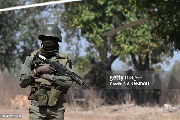 An Ivorian soldier provides security on arrival of Ivorian Prime Minister Patrick Achi at the launch of a vast aid plan for young people in regions...