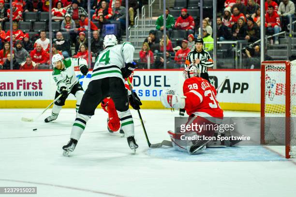 Dallas Stars Right Wing Joe Pavelski centers the puck to Dallas Stars Center Roope Hintz in overtime during regular season NHL hockey game between...