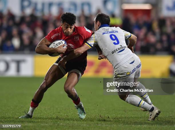 Robert Baloucoune of Ulster and Morgan Parra of Clermont during the Heineken Champions Cup match between Ulster Rugby and ASM Clermont Auvergne at...