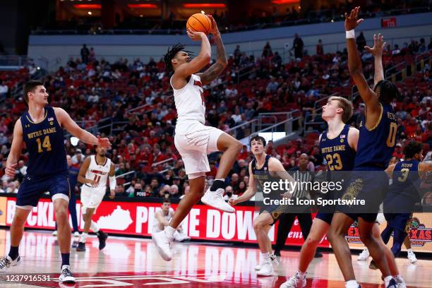 Louisville Cardinals guard Dre Davis goes up with the off balance shot during a mens college basketball game between the Notre Dame Fighting Irish...