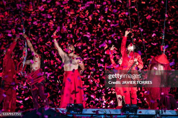 Artists of the French company Gratte Ciel perform 'Rouge!', an aerial and ground acrobatics show during the Santiago a mil 2022 Festival, in Santiago...