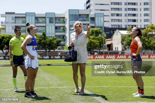 Danielle Laidley, Emma Kearney of the Kangaroos and Alicia Eva of the Giants are seen at the coin toss during the 2022 AFLW Round 03 match between...