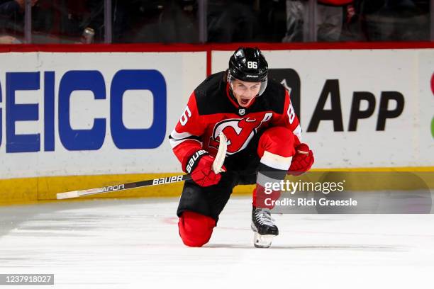 Jack Hughes of the New Jersey Devils celebrates after scoring during the third period of the National Hockey League game between the New Jersey...