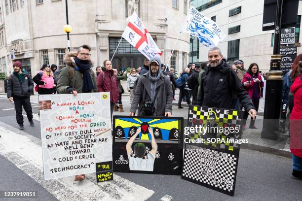 Protestors seen expressing their fury against police violence via artwork, during the demonstration. By April 2022, 100k members of the NHS will have...