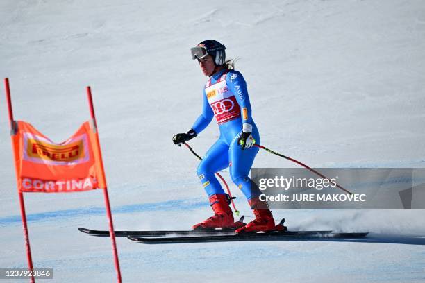 Italy's Sofia Goggia goes down the slope after crashing during the Women's Super G as part of the FIS Alpine World Ski Championships in Cortina...