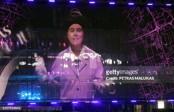 Video projection is seen on the facade of the Zalgiris Arena during a light show, as part of the opening ceremony of the European Capital of Culture,...