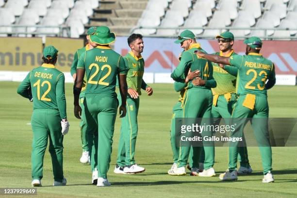 Keshav Maharaj of South Africa celebrates the wicket of Virat Kohli of India during the 3rd Betway One Day International match between South Africa...