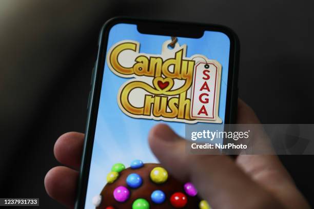 Candy Crush Saga logo displayed on a phone screen is seen in this illustration photo taken in Krakow, Poland on January 23, 2022.