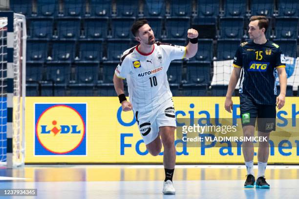 Germany's Fabian Wiede reacts during the Men's European Handball Championship match group II between Germany and Sweden in Bratislava, Slovakia, on...