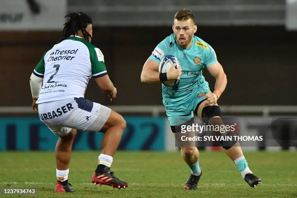 Exeter Chiefs' English hooker Luke Cowan-Dickie runs with a ball during the European Champions Cup Pool A rugby union match between Montpellier and...