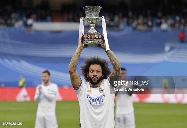 Marcelo Vieira greets the fans with the trophy on behalf of the players of the Real Madrid team that won the Spanish Super Cup, prior to the La Liga...