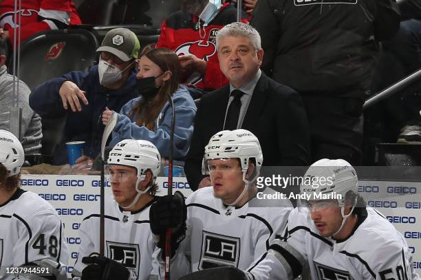 Head coach Todd McLellan of the Los Angeles Kings looks on from the bench during the game against the New Jersey Devils at The Prudential Center on...