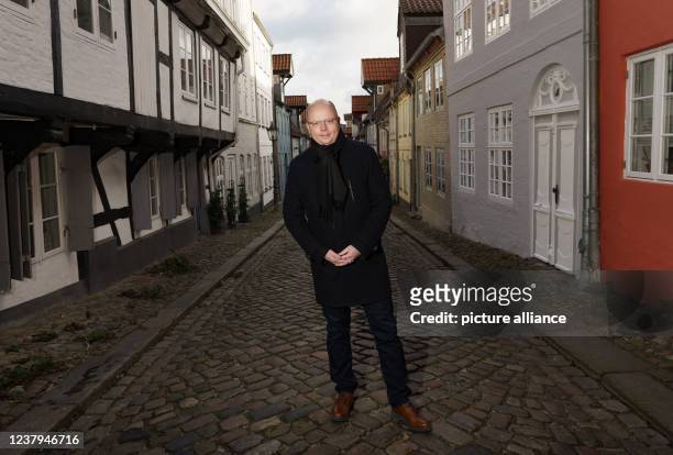 January 2022, Schleswig-Holstein, Flensburg: Stefan Seidler , the only member of parliament from the Südschleswigsche Wählerverband, stands in...
