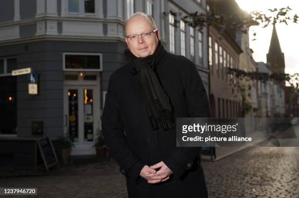 January 2022, Schleswig-Holstein, Flensburg: Stefan Seidler , the only member of the Bundestag of the Südschleswigsche Wählerverband, stands in the...