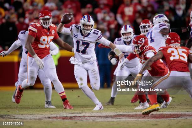 Buffalo Bills quarterback Josh Allen runs the ball during the AFC Divisional Round playoff game against the Kansas City Chiefs on January 23rd, 2022...